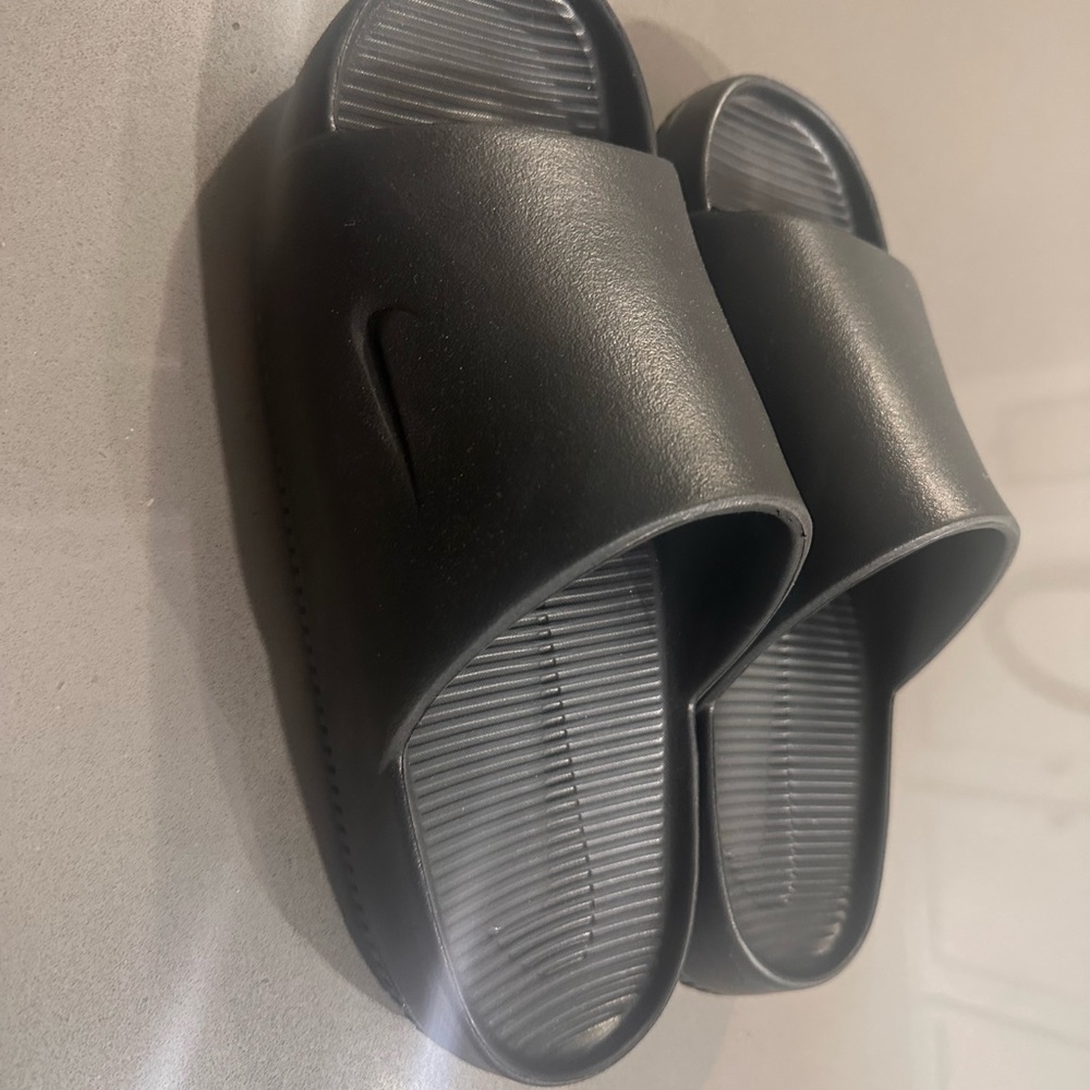Men’s size 12 Nike Calm Slides.